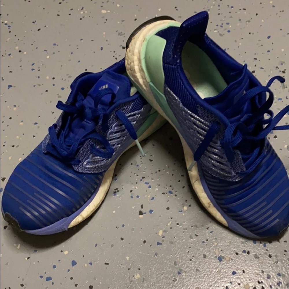Blue and aqua running shoes.